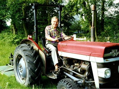 Peter Roberts driving a tractor