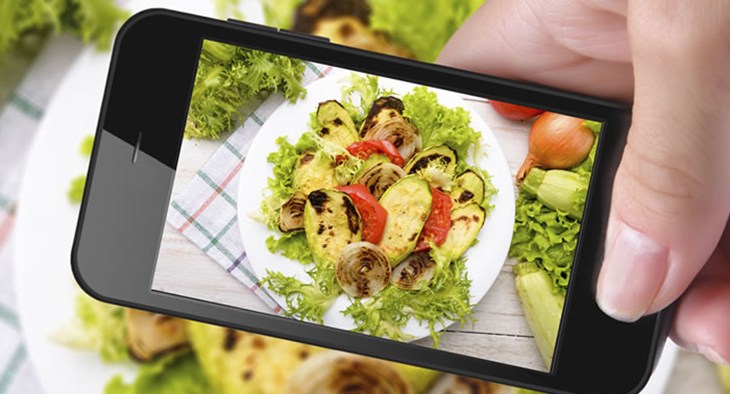 Smartphone taking photo of food