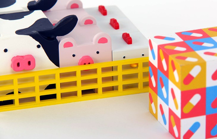 A toy factory farm, animals with antibiotics
