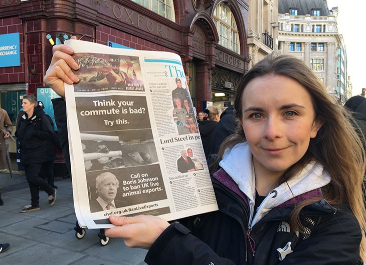 Natasha Smith Holding Newspaper