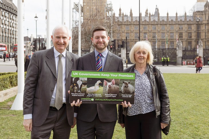 Daniel Zeichner MP, Jim McMahon MP & Ruth Jones MP holding a 'Keep Your Promises' sign with the Houses of Parliament in the background