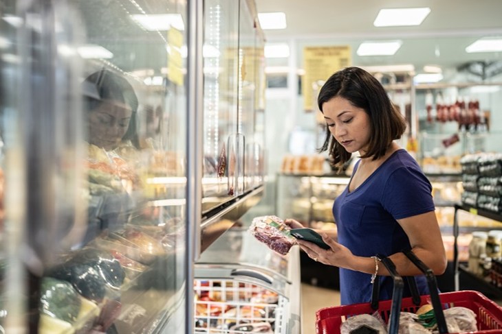 Women choosing food in a super market