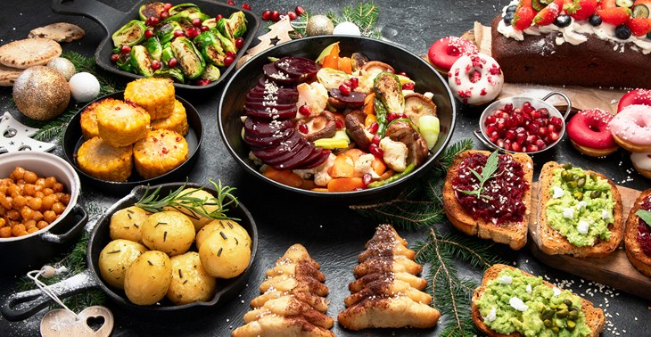 Table filled with plant-based Christmas food